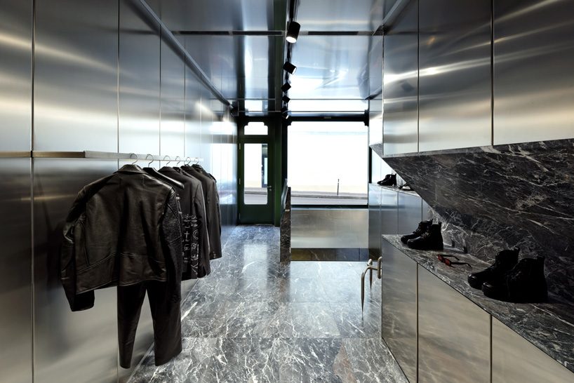 didier faustino mixes marble + steel within the enfants riches déprimés boutique in paris