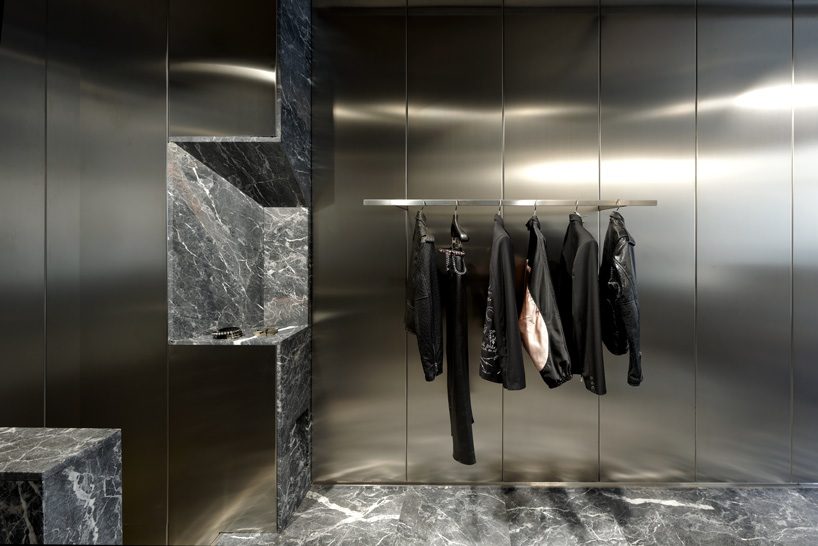 didier faustino mixes marble + steel within the enfants riches déprimés boutique in paris