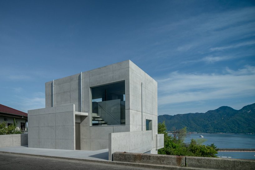 kazunori fujimoto architects completes all-concrete house on a sloping site in ajina, japan