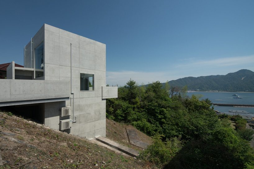 kazunori fujimoto architects completes all-concrete house on a sloping site in ajina, japan