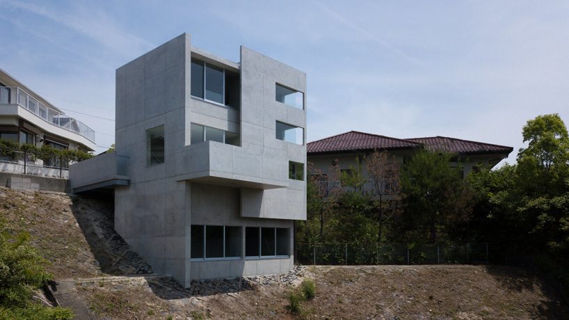 kazunori fujimoto architects completes all-concrete house on a sloping site in ajina, japan