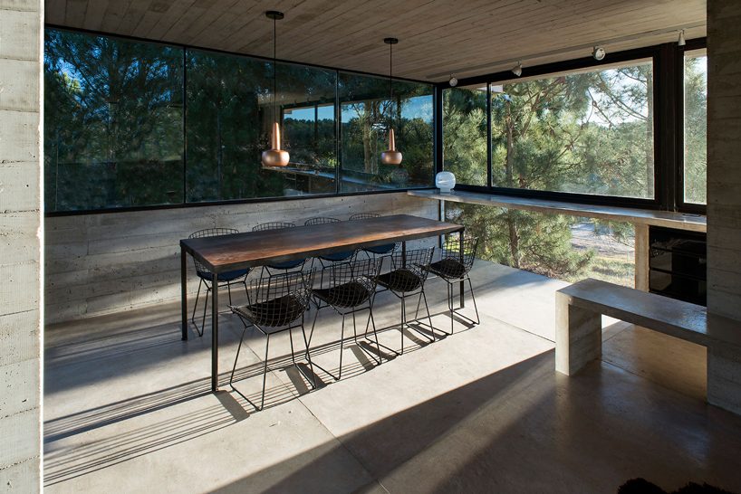 luciano kruk stacks concrete volumes to build a 'house in the trees' in buenos aires designboom