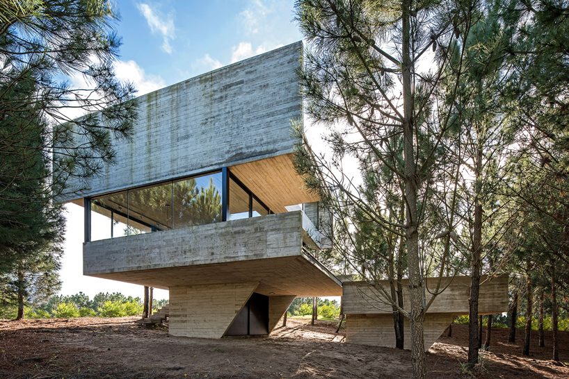 luciano kruk stacks concrete volumes to build a 'house in the trees' in buenos aires designboom