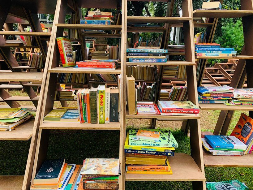 NUDES fabricates the 'bookworm' pavilion to foster a love of reading in india designboom