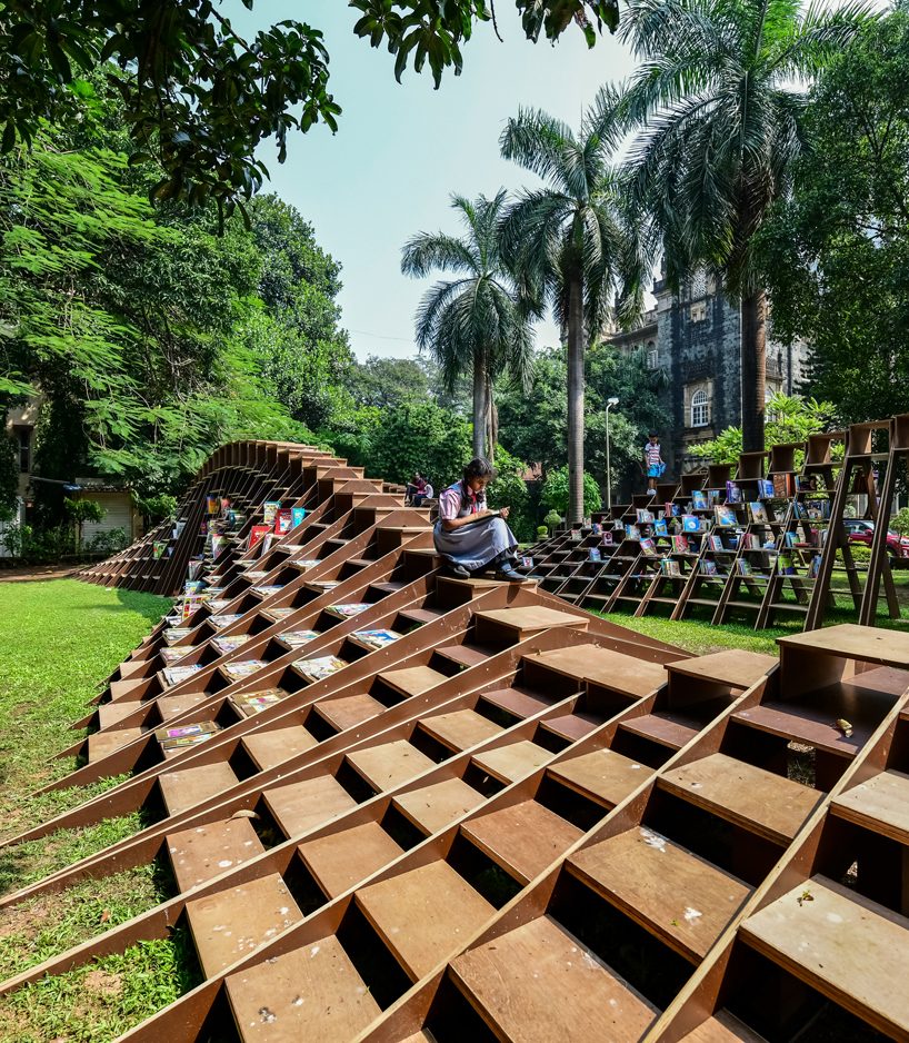 NUDES fabricates the 'bookworm' pavilion to foster a love of reading in india designboom