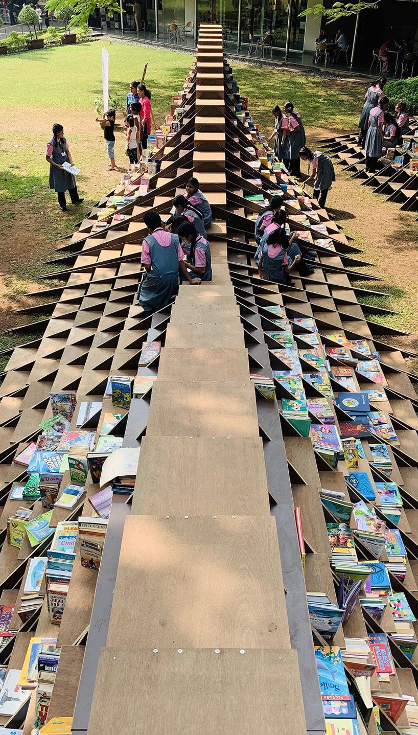 NUDES fabricates the 'bookworm' pavilion to foster a love of reading in india designboom