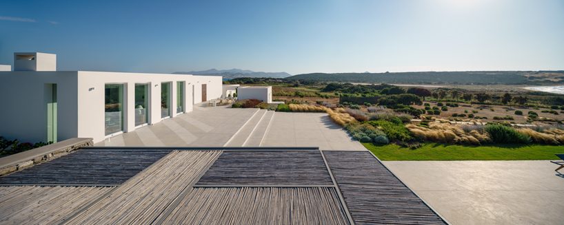 react architects steps 'the gaze' house into idyllic greek island landscape designboom