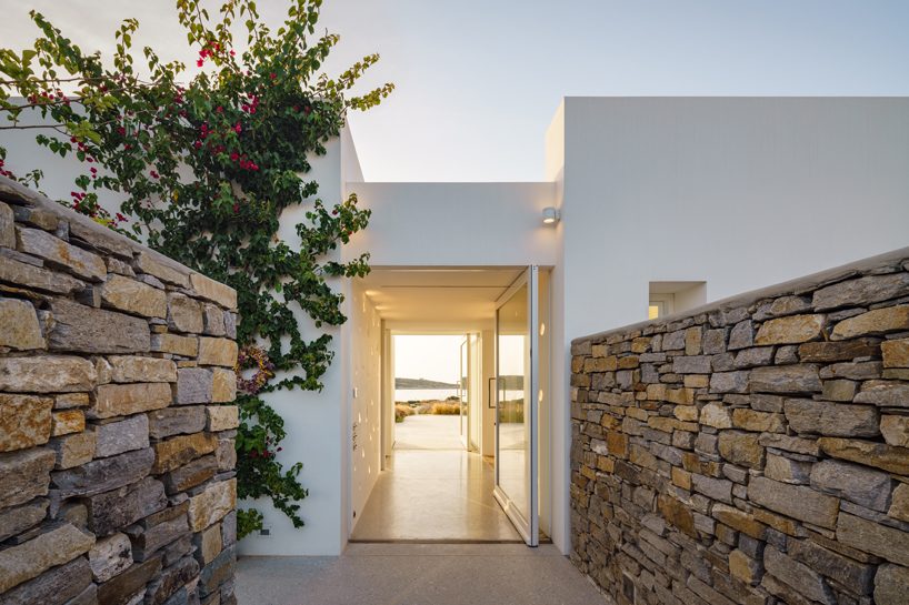 react architects steps 'the gaze' house into idyllic greek island landscape designboom