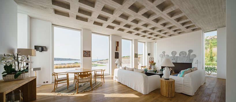 react architects steps 'the gaze' house into idyllic greek island landscape designboom