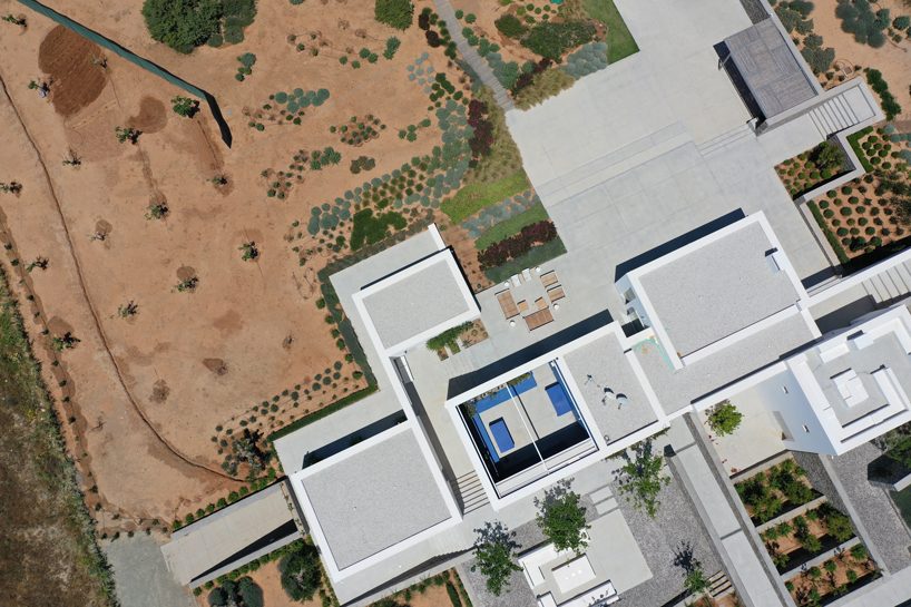 react architects steps 'the gaze' house into idyllic greek island landscape designboom