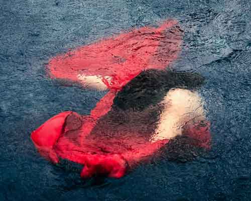 emilie möri captures the fluid movement of fabric under the monsoon rains of thailand