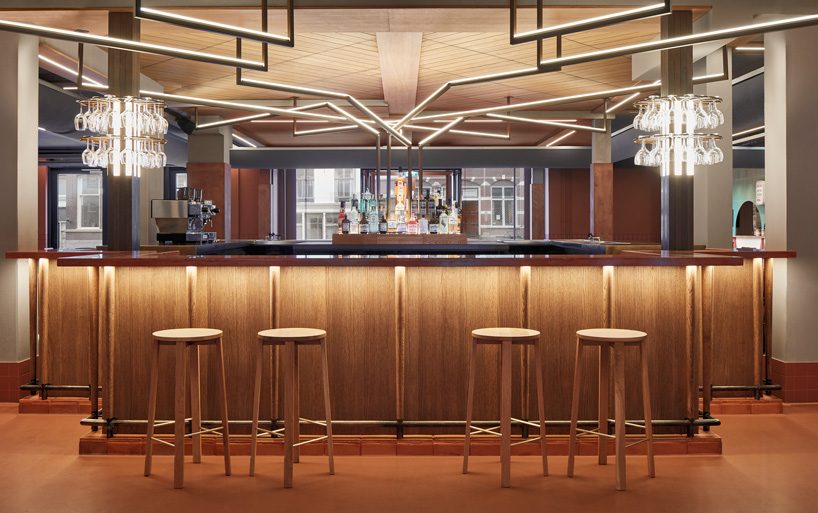 studio modijefsky designs 'foodhallen' food court in the hague as indoor urban piazza