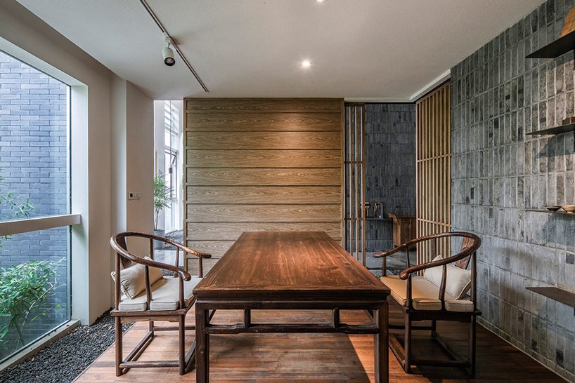 TEMP combines timber and granite to design ajia teahouse in a chinese national park designboom