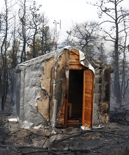 engineers created a huge foil blanket that protects homes from forest fires