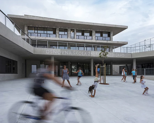 x3m builds a new school in croatia to incorporate large outdoor spaces for the community