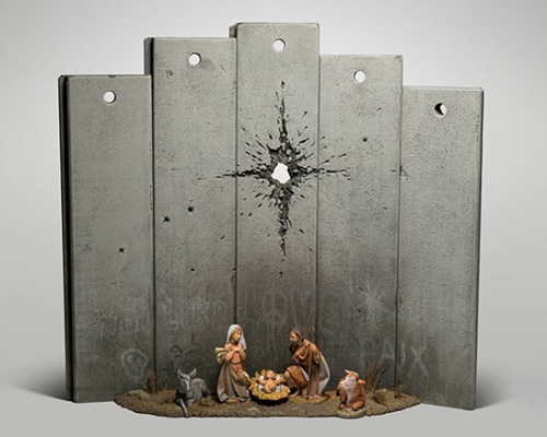 banksy unveils 'scar of bethlehem' nativity complete with israel's west bank barrier