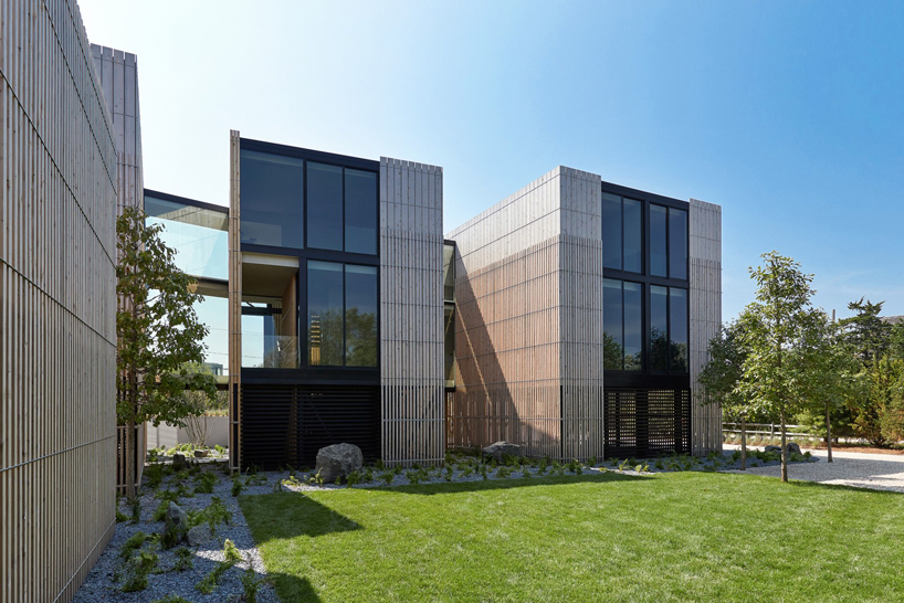 bates masi + architects breaks apart flood-safe house in the US in series of smaller volumes