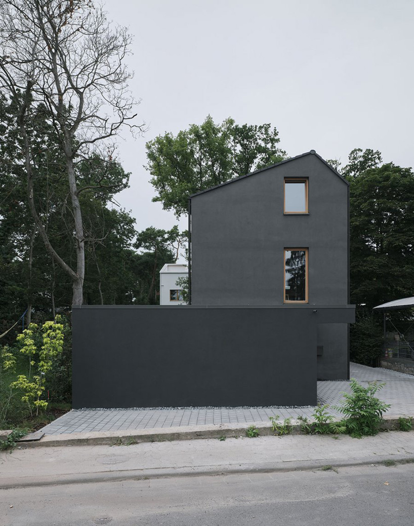 HGA, marc flick & christian stock build monolithic all-black house in  germany