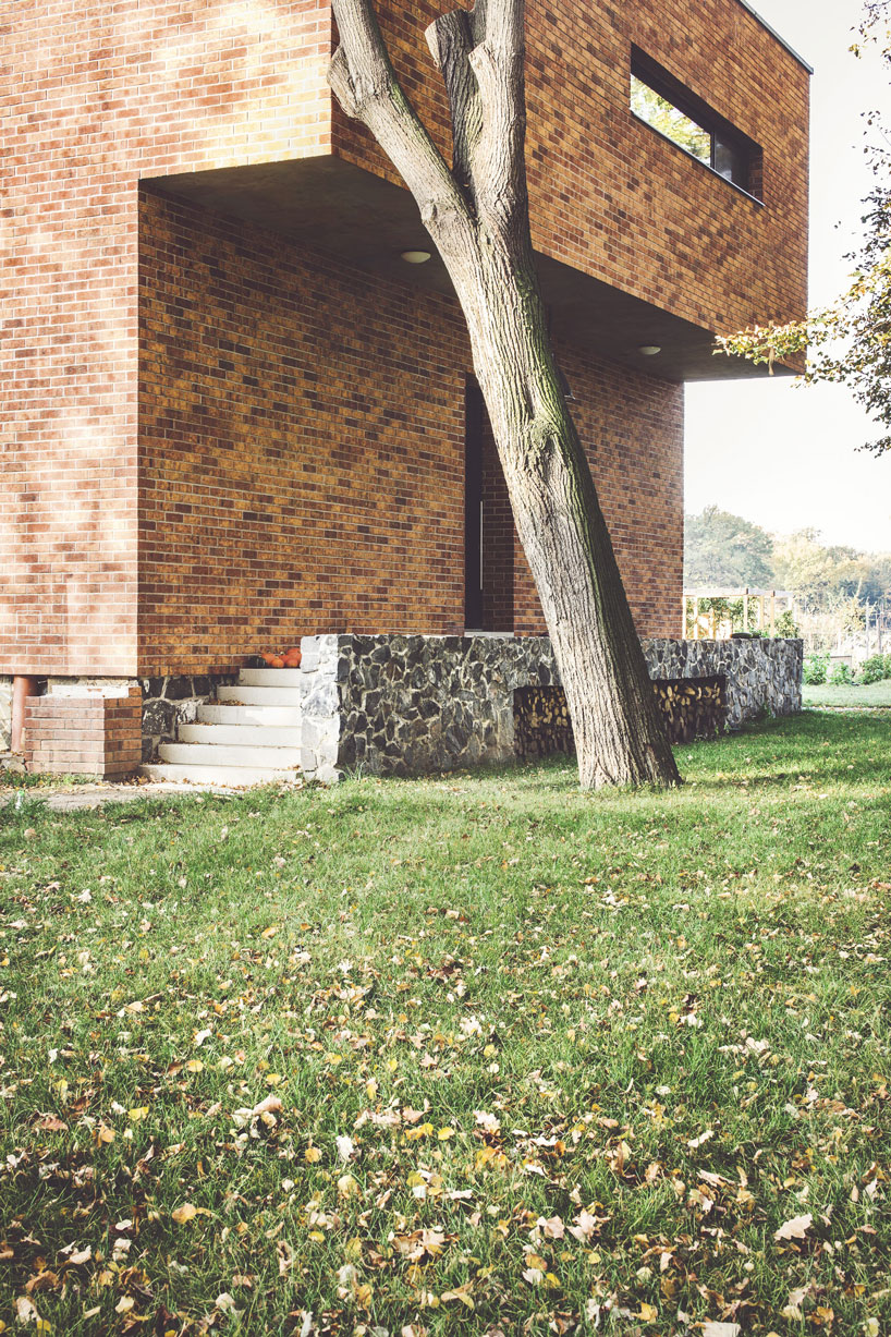 edit! renovates an old brick guardhouse to create a family home in prague designboom