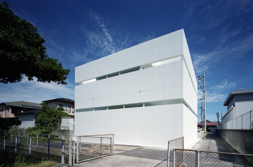  fujiwaramuro architects adds transparent built-in garage to house in takamatsu, japan
