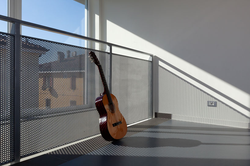 iosa ghini associati builds a youth center as part of post-earthquake restoration in italy designboom