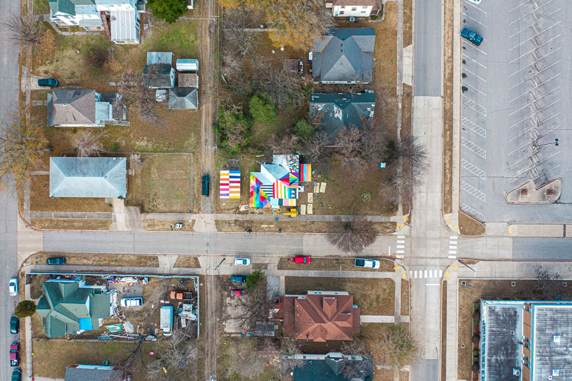 okuda san miguel transforms neglected home into 'rainbow embassy' art center