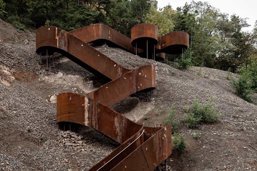 reiulf ramstad reconverts railway into 11km route of corten steel installations in france