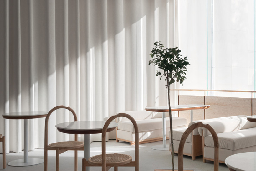 say architects clads angelot patisserie in hangzhou in a curved tile façade - 5