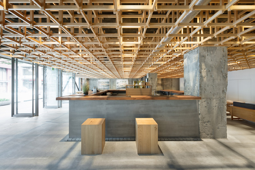 yusuke seki tops kumu hotel in kanazawa, japan, with timber grid ceiling