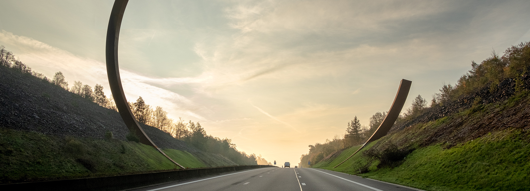 bernar venet frames belgian motorway in monumental corten steel l'arc majeur