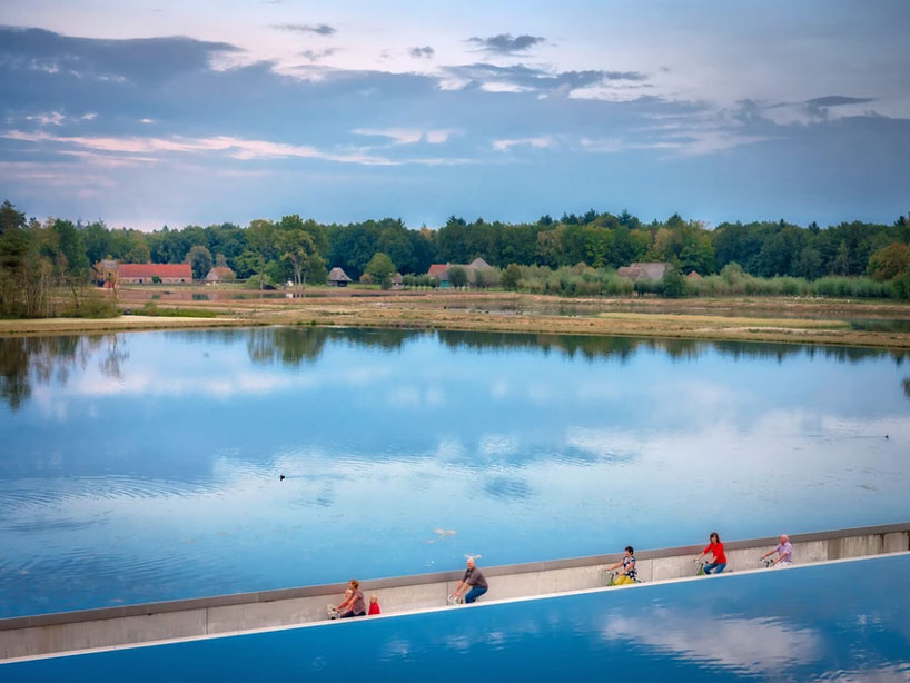 burolandschap's landscape design lets you ‘cycle through water’ in belgium designboom