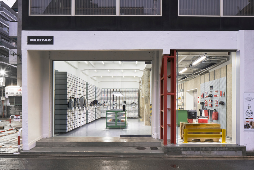  freitag opens store in kyoto, complete with DIY workshop + industrial aesthetics