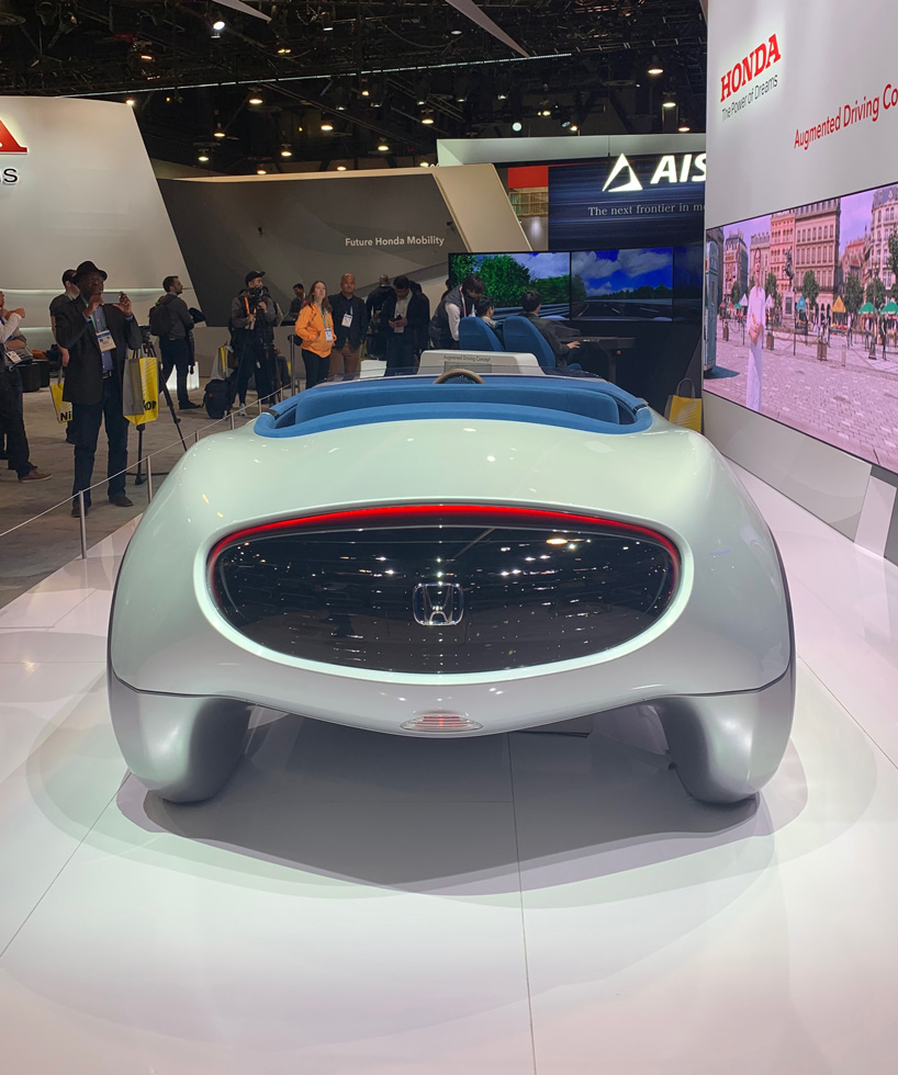 the honda augmented driving concept lets drivers change lanes by swiping left or right