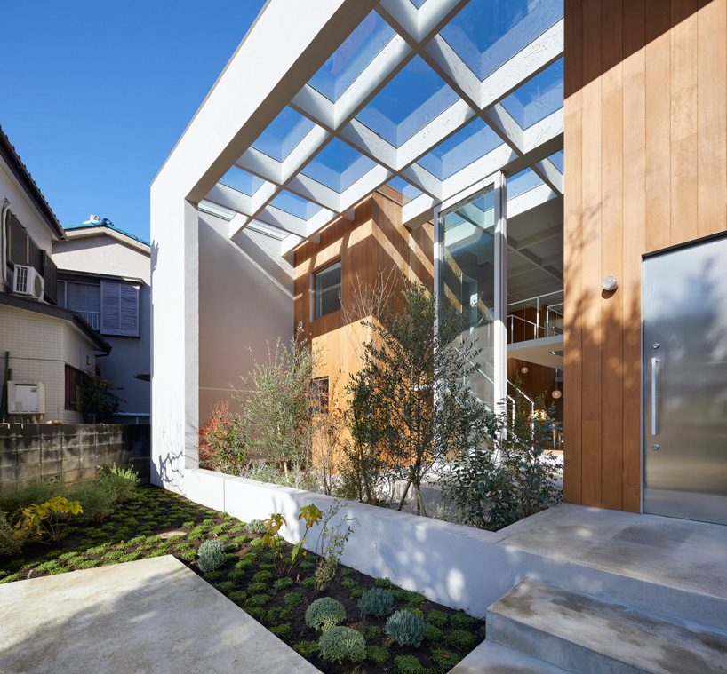 airhouse incorporates nature into this house in takao, japan, via exterior + interior terraces