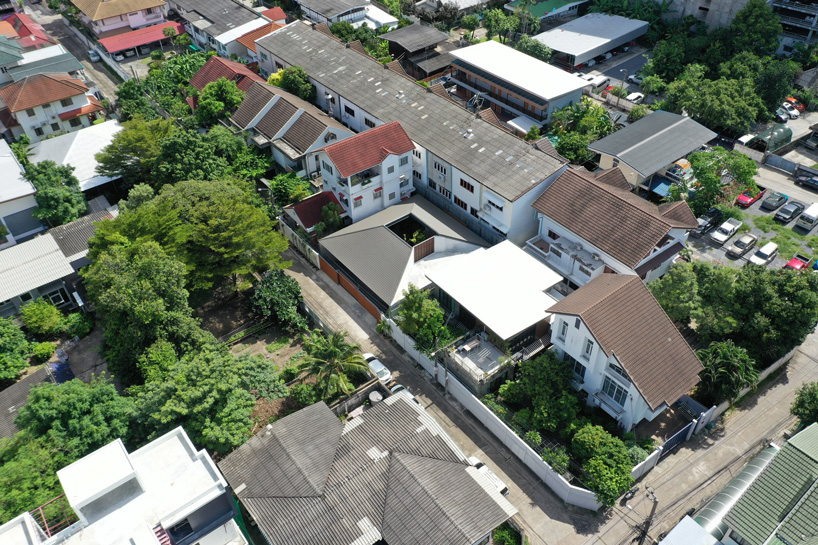 looklen architects builds the roof house in thailand around a central open courtyard