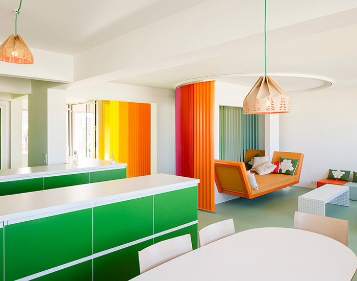 aptly named 'le rainbow et le bosquet', the apartment proposes a white
