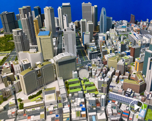 japanese hobbyist crafts miniature model of tokyo's shinjuku district out of paper