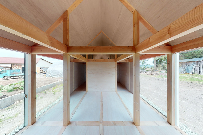  motoki ishikawa architect and associates constructs 50-meter-long wooden house in japan