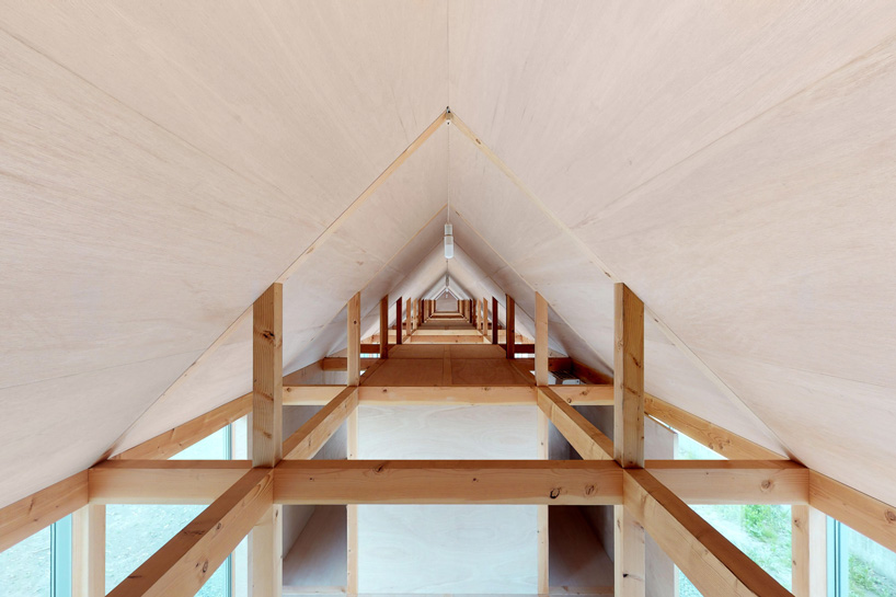 motoki ishikawa architect and associates constructs 50-meter-long wooden house in japan - 3