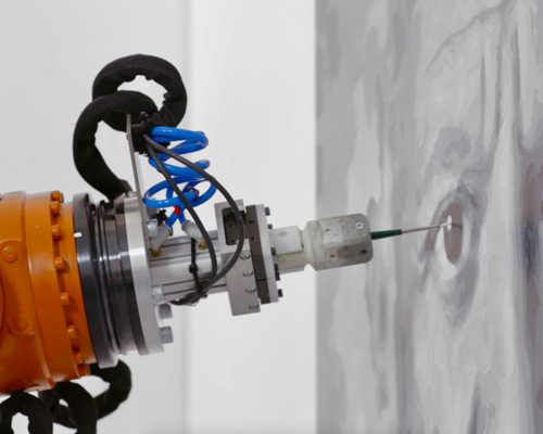 these robotically-painted portraits are among the first cultural artifacts of a dawning age