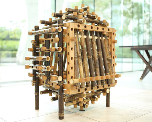 shigeki yamamoto composes intricate cabinet from japanese bamboo and german oak