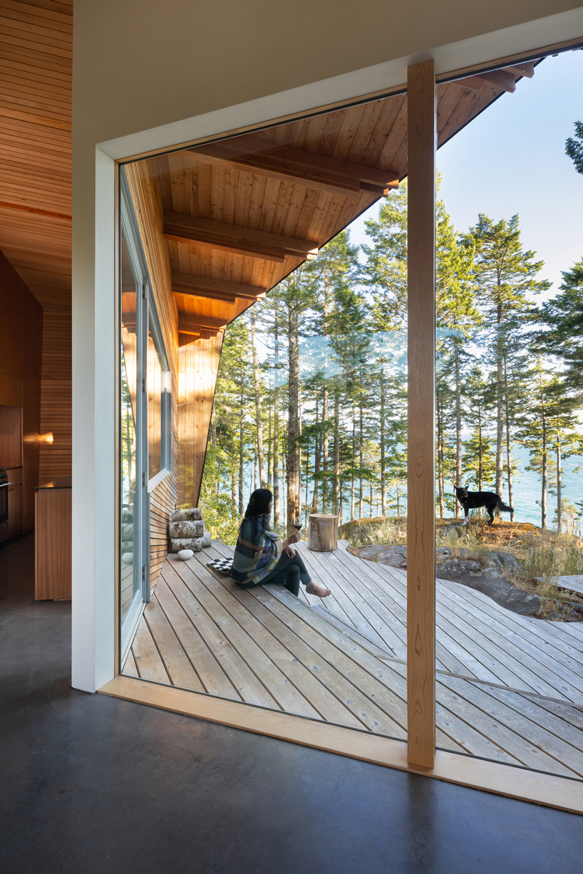 campos studio embeds the sooke house within the forest of a rocky hill in canada - 3