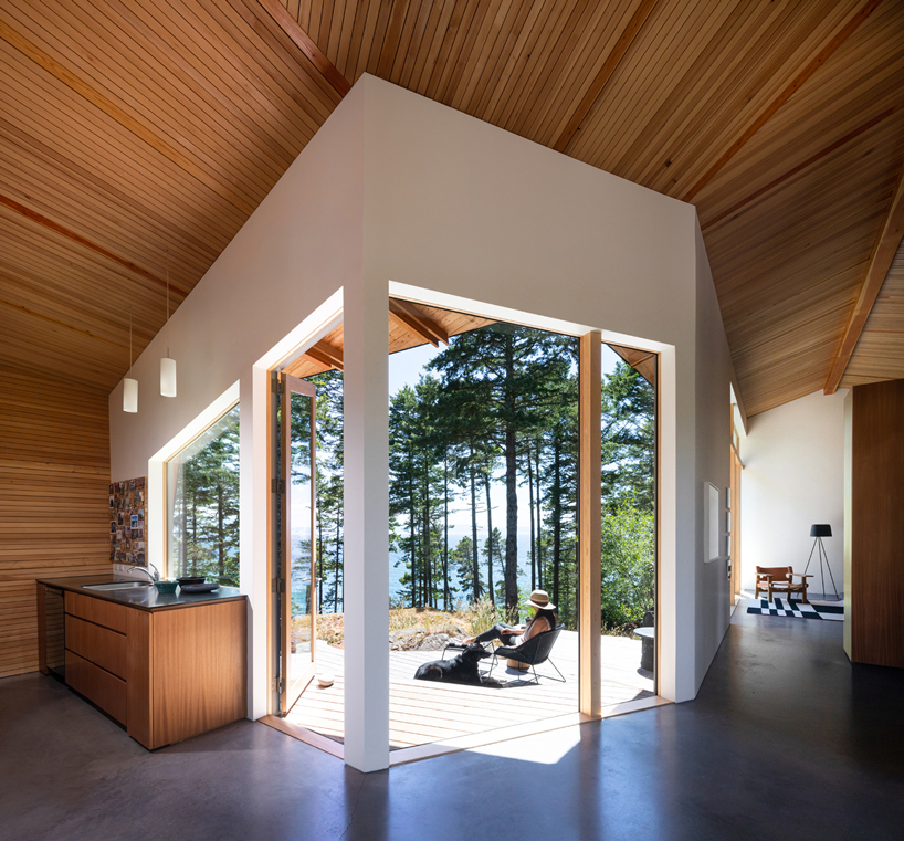 campos studio embeds the sooke house within the forest of a rocky hill in canada - 1
