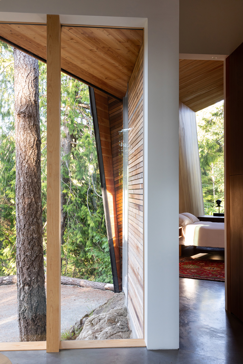 campos studio embeds the sooke house within the forest of a rocky hill in canada - 2