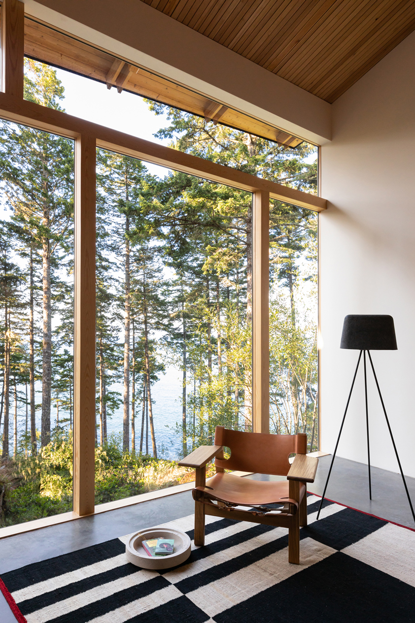 campos studio embeds the sooke house within the forest of a rocky hill in canada - 4