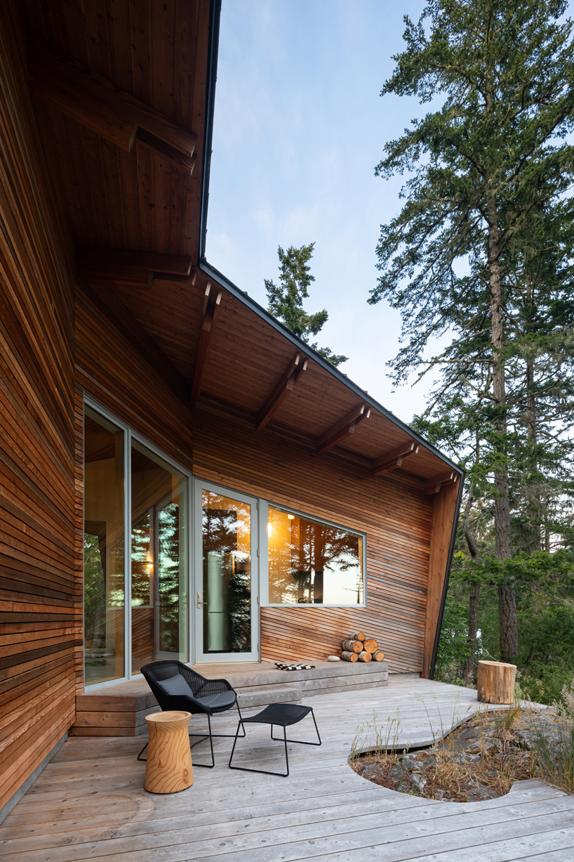campos studio embeds the sooke house within the forest of a rocky hill in canada - 5