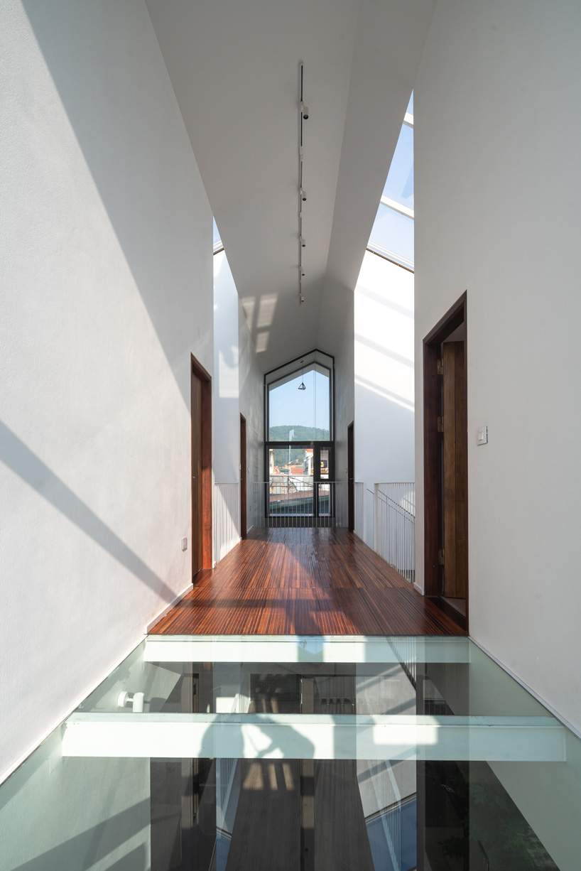 toob studio builds hạ long house in vietnam as sequence of interconnected spaces
