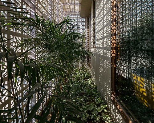 sanjay puri architects uses 18 screens to shield house in northern india from the hot sun
