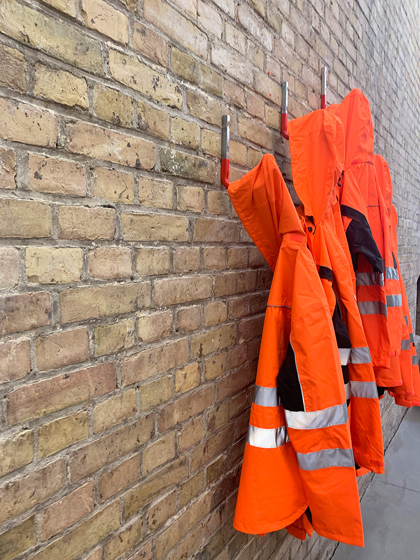 ai weiwei makes DIY sculpture with HORNBACH: safety jackets zipped the other way - 5