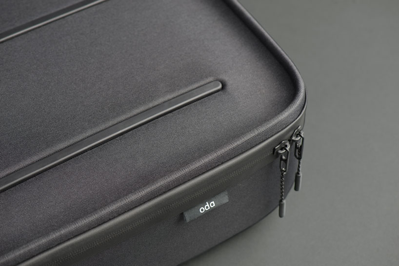 hop by LAYER x ODA is a modular bag that transitions from office to airport designboom